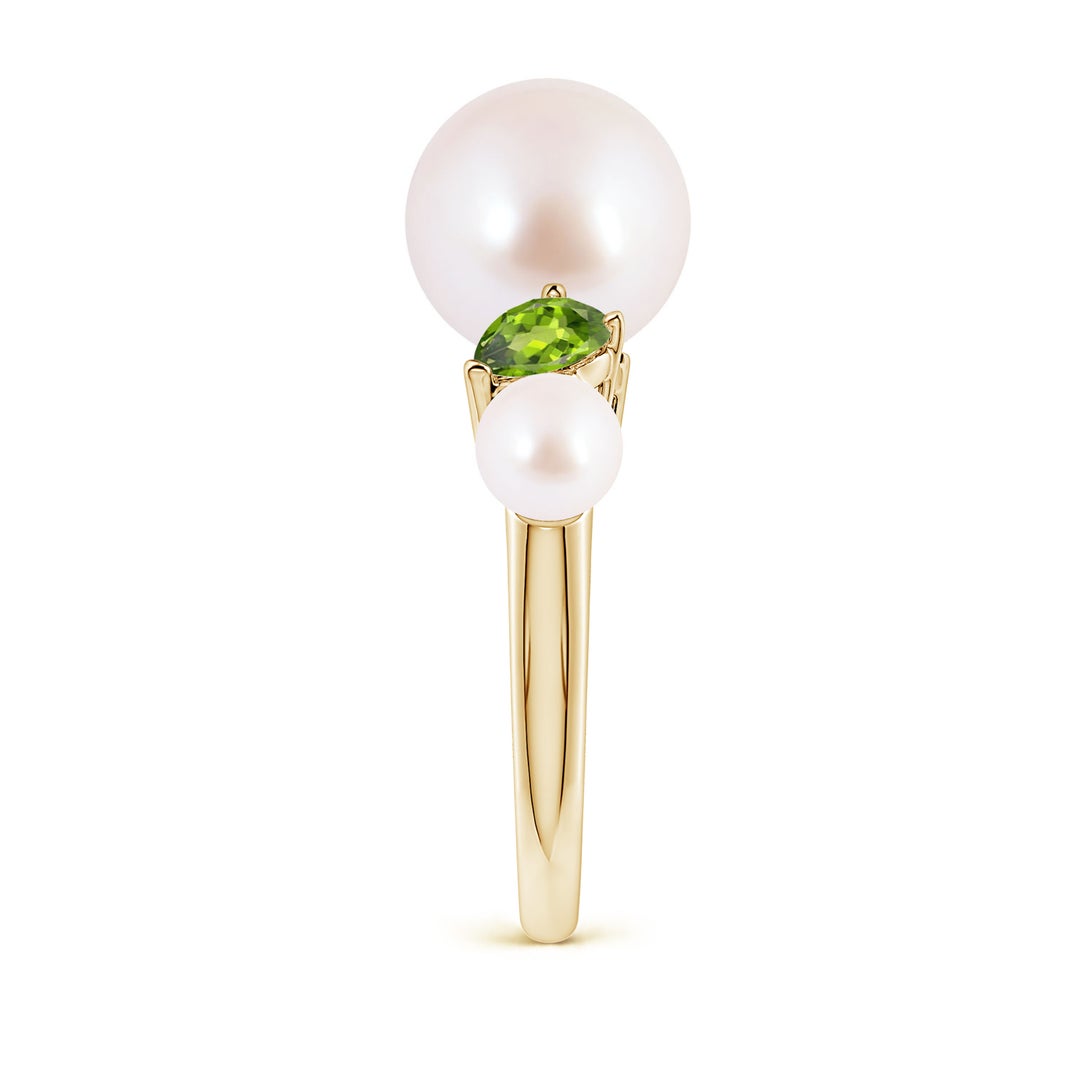 9mm AAA Akoya Pearl and Tilted Pear Peridot Tapered Shank Ring in Yellow Gold - side 3