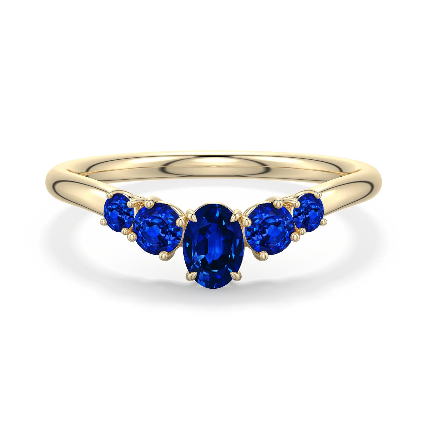 5x4mm AAAA Oval Blue Sapphire Graduated Side Stone Engagement Ring in Yellow Gold - main